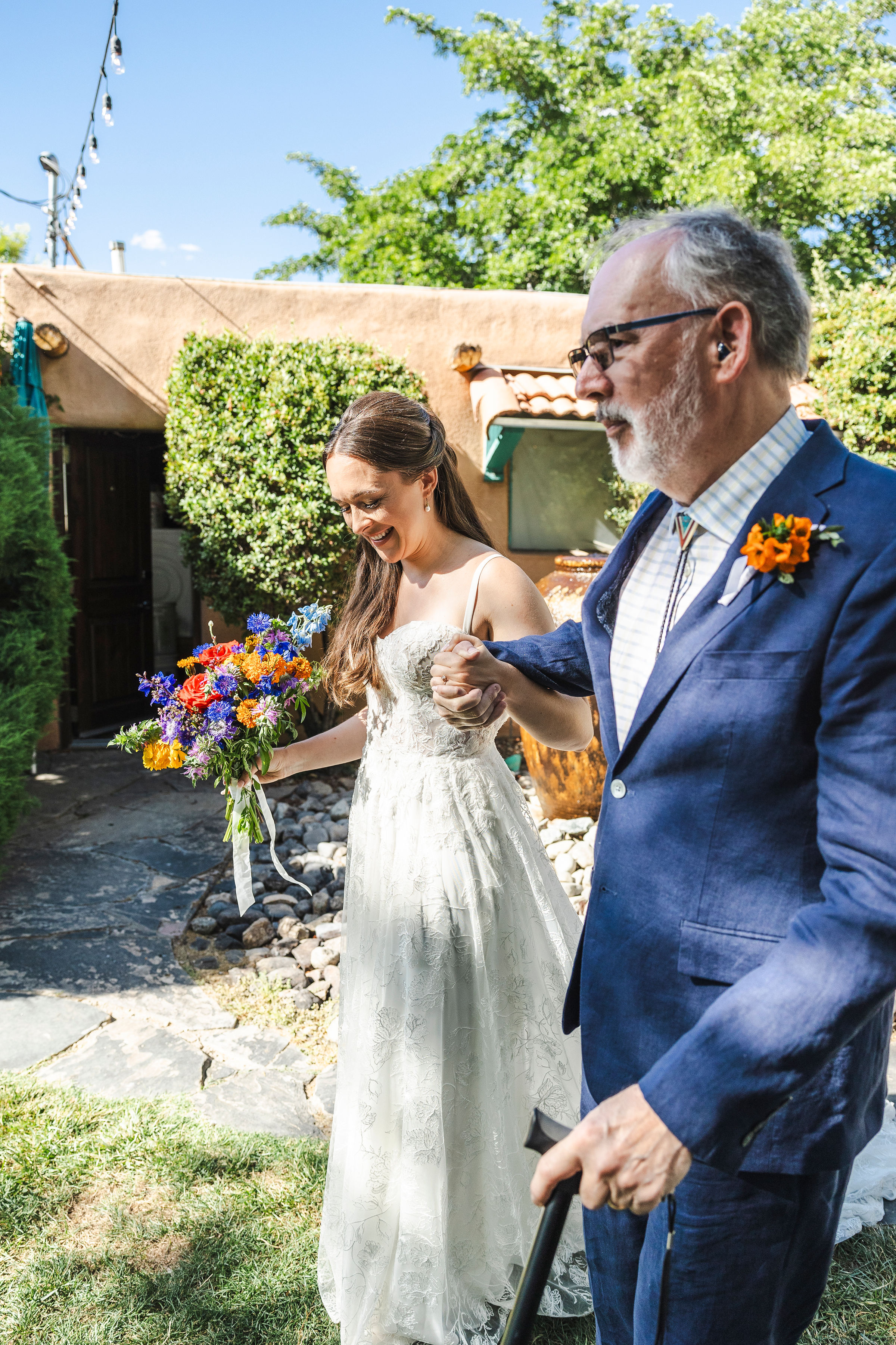 grace and scott walking down the aisle